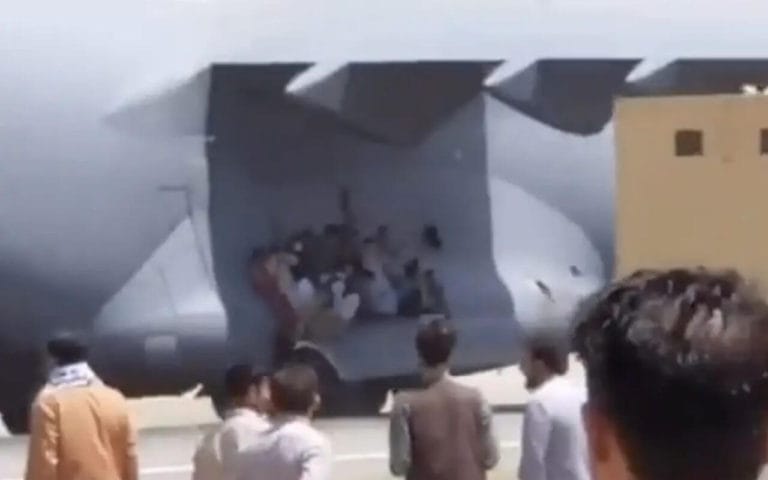 Body of The Afghan Found In The Landing Gear of a US Air Force Plane Carrying Afghans Trying to Flee The Taliban by Clinging to Plane
